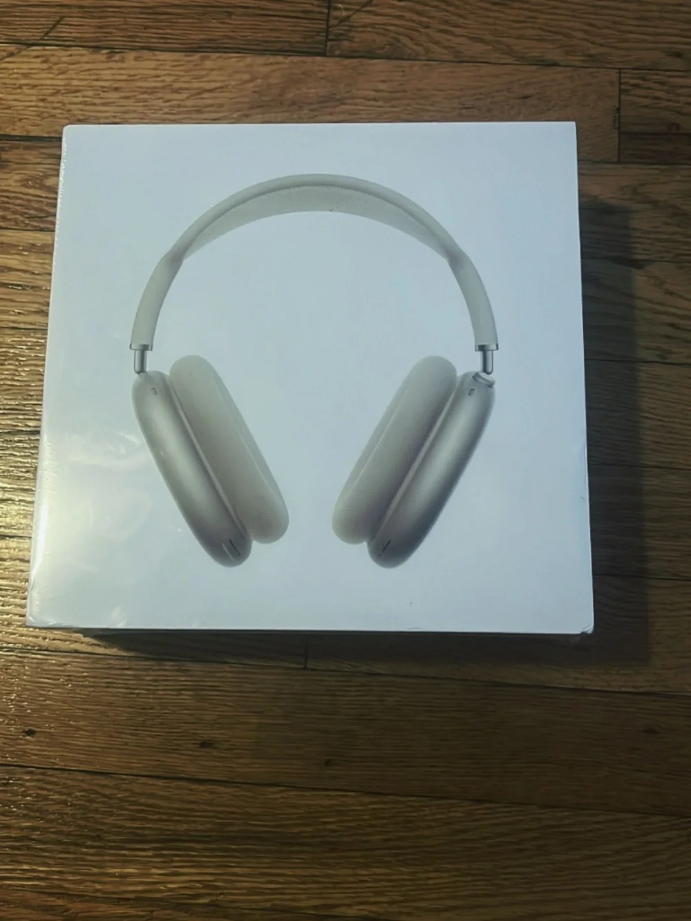 Tan AirPod maxes